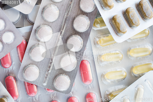 Image of different pills and capsules of drugs