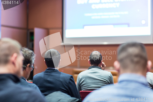 Image of Audience in conference hall listening to presentation on business conference.