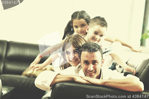 Image of young family at home