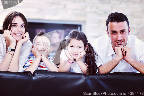 Image of young family at home