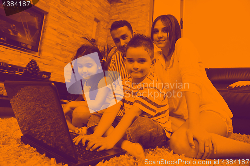 Image of young family at home