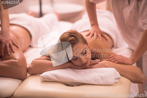 Image of couple receiving a back massage