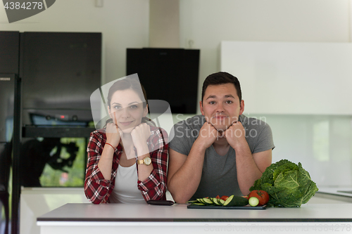 Image of Young couple in the kitchen