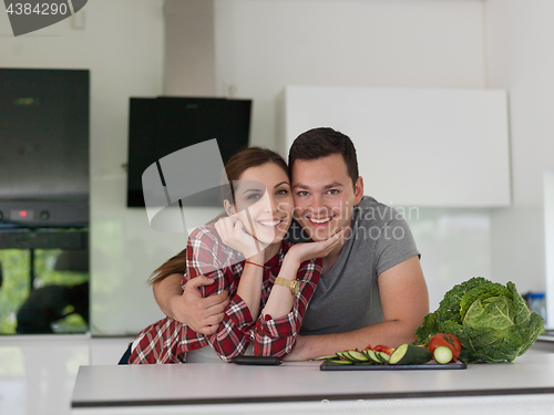 Image of Young couple in the kitchen
