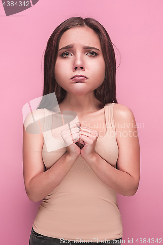 Image of The young woman\'s portrait with sad emotions