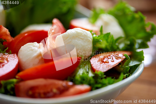 Image of close up of vegetable salad with mozzarella