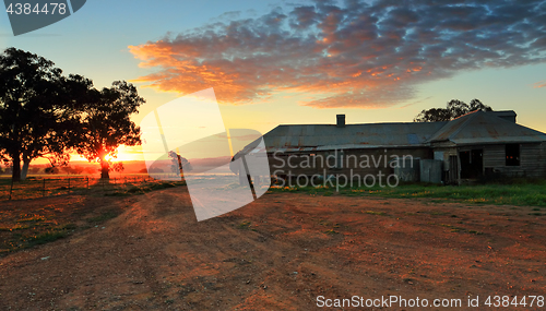 Image of Farm buildings at sunset