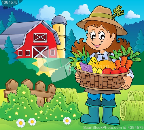 Image of Woman farmer holding harvest theme 2