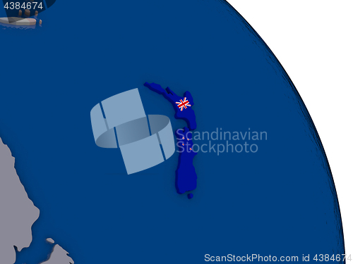 Image of New Zealand with flag on globe