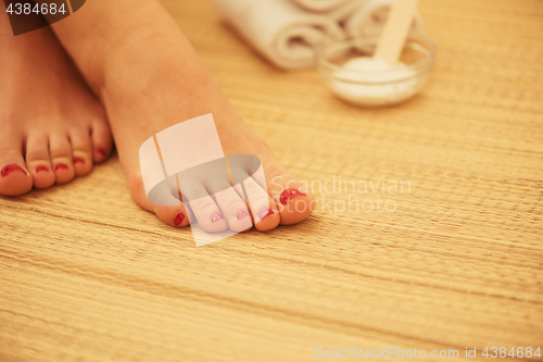 Image of female feet at spa salon