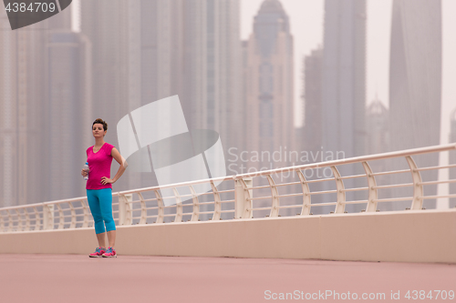 Image of woman running on the promenade