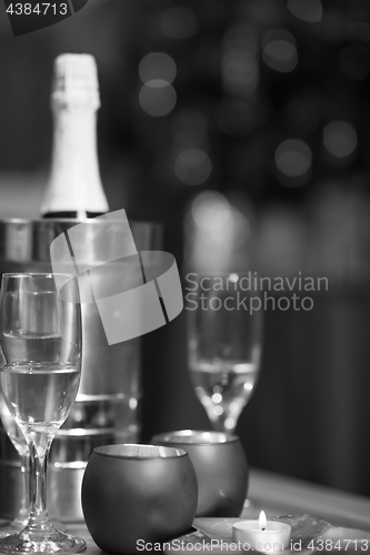 Image of champagne on a wooden table
