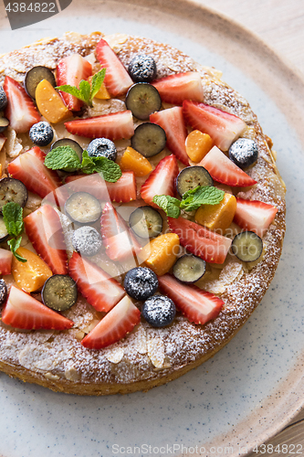 Image of cakes with fruit and berries