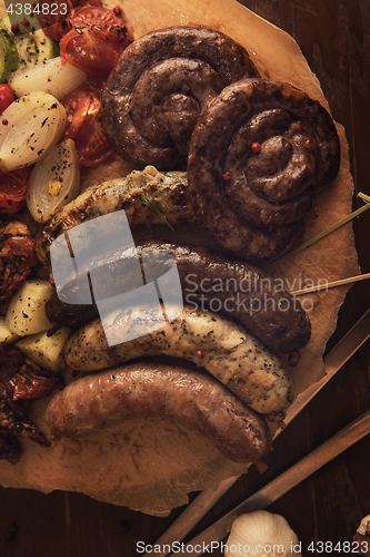 Image of Grilled sausages with vegetables