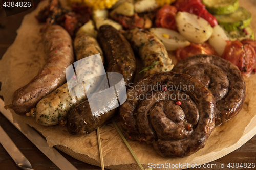 Image of Grilled sausages with vegetables