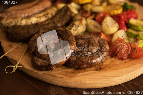 Image of Grilled sausages with vegetables