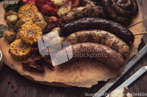 Image of Grilled sausages with vegetables