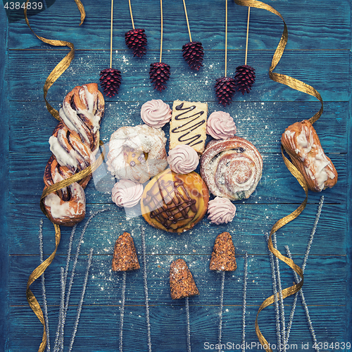 Image of Different cookies on blue wooden
