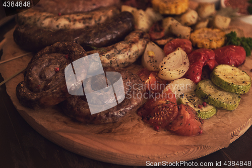 Image of Grilled sausages with vegetables