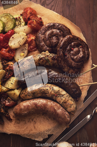 Image of Grilled sausages with vegetables