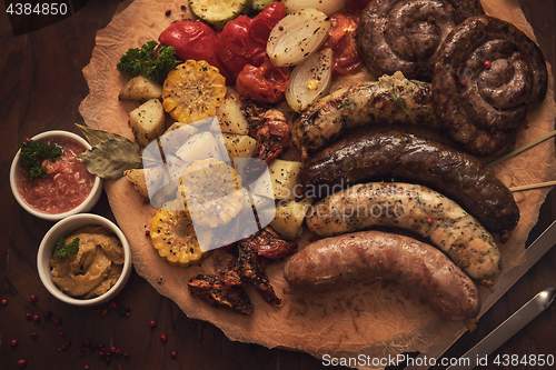 Image of Grilled sausages with vegetables