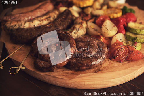 Image of Grilled sausages with vegetables