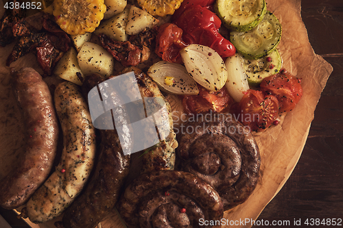 Image of Grilled sausages with vegetables