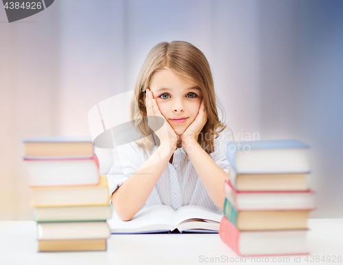 Image of student girl reading book