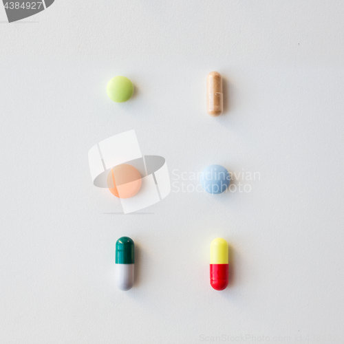 Image of different pills and capsules of drugs