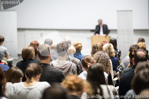 Image of Business speaker giving a talk at business conference event.