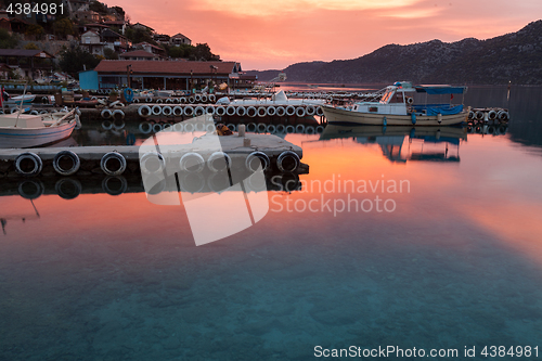 Image of Sunrise over small fishers village