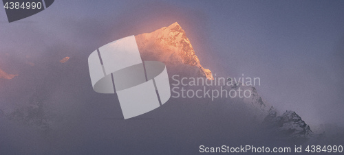 Image of Nuptse and Everest summits at sunset or sunrise