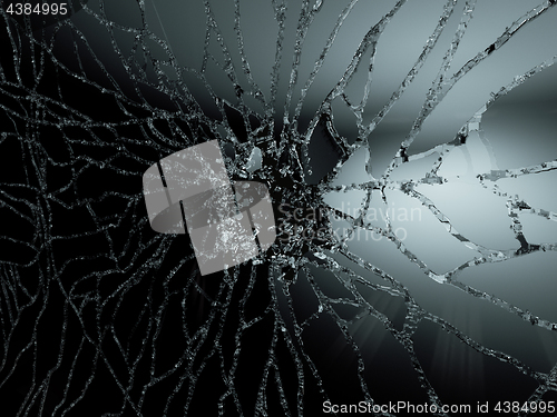 Image of Pieces of destructed Shattered glass on black