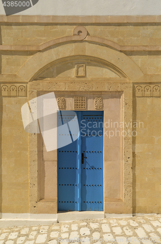 Image of Old Blue door with arch from Tunisia