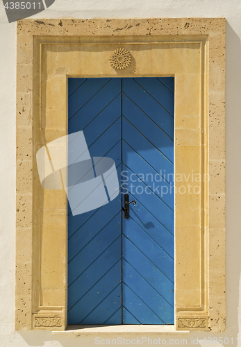 Image of Old Blue door with arch from Tunisia