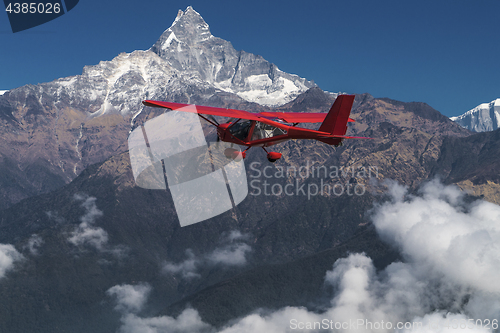 Image of Ultralight plane flies over Pokhara and Annapurna region
