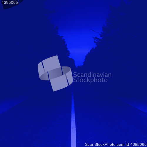 Image of Dark Blue Background With Vanishing Road