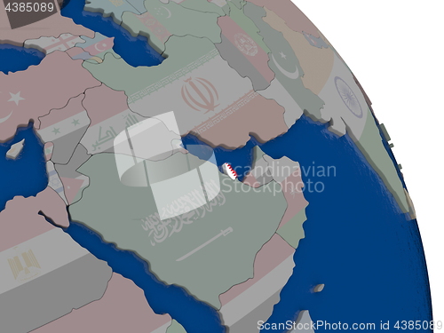 Image of Qatar with flag on globe
