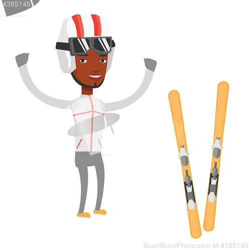 Image of Cheerful skier standing with raised hands.