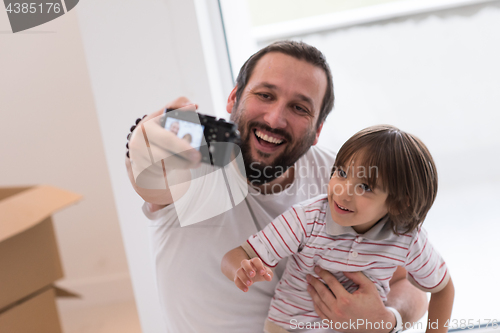 Image of selfie father and son