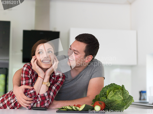 Image of Young couple in the kitchen