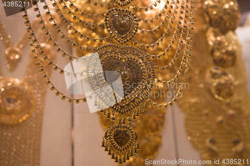 Image of gold jewelry in the shop window