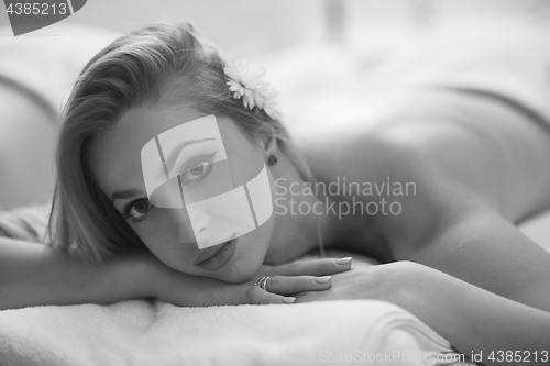 Image of woman laying on massage table