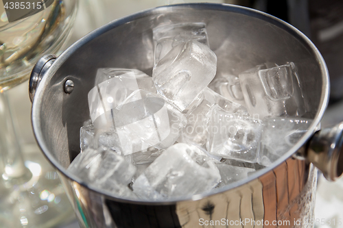 Image of Bucket with ice cubes