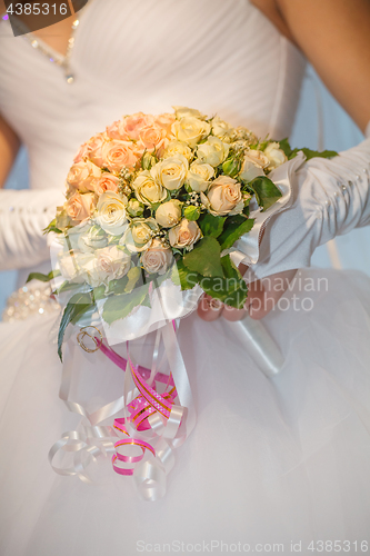 Image of Bride holding wedding bouquet