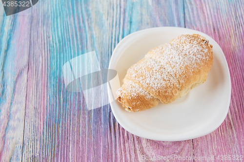 Image of Tasty eclair on plate