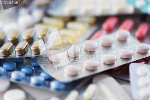 Image of different pills and capsules of drugs