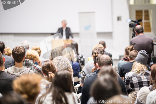 Image of Business speaker giving a talk at business conference event.