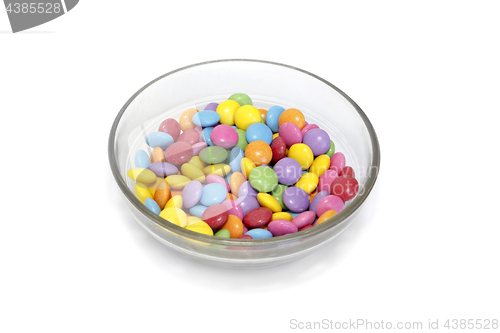 Image of Bright colorful candy in bowl on white background