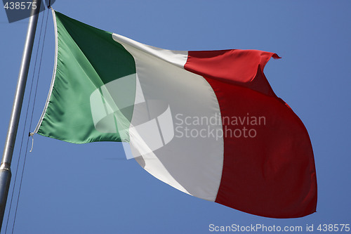 Image of the italian flag flying in the breeze